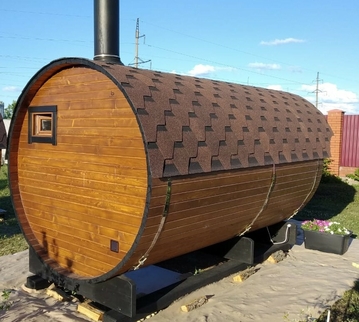 Баня-бочка с дровяной печью и зоной отдыха