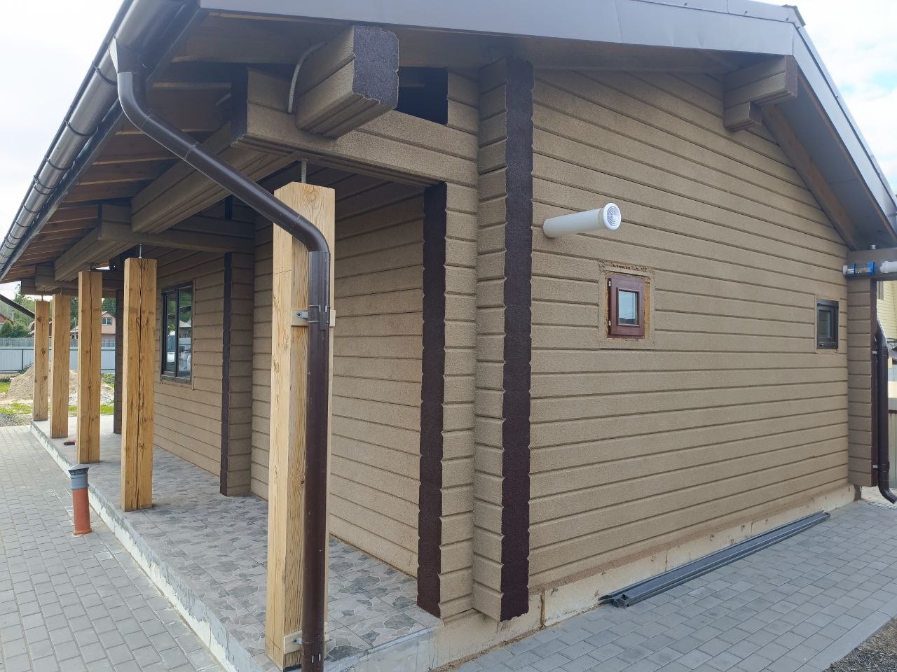 Напыляемая пробка на фасаде