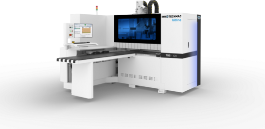 Автоматический сверлильно-присадочный станок с ЧПУ TBS‑420 белого цвета на производстве мебели