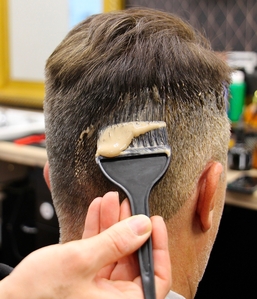 Professional scalp treatment for men at a luxury barbershop in Prague
