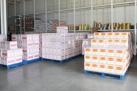 склад готовой продукции - коробки с фасованным подсолнечным маслом Мамруковское