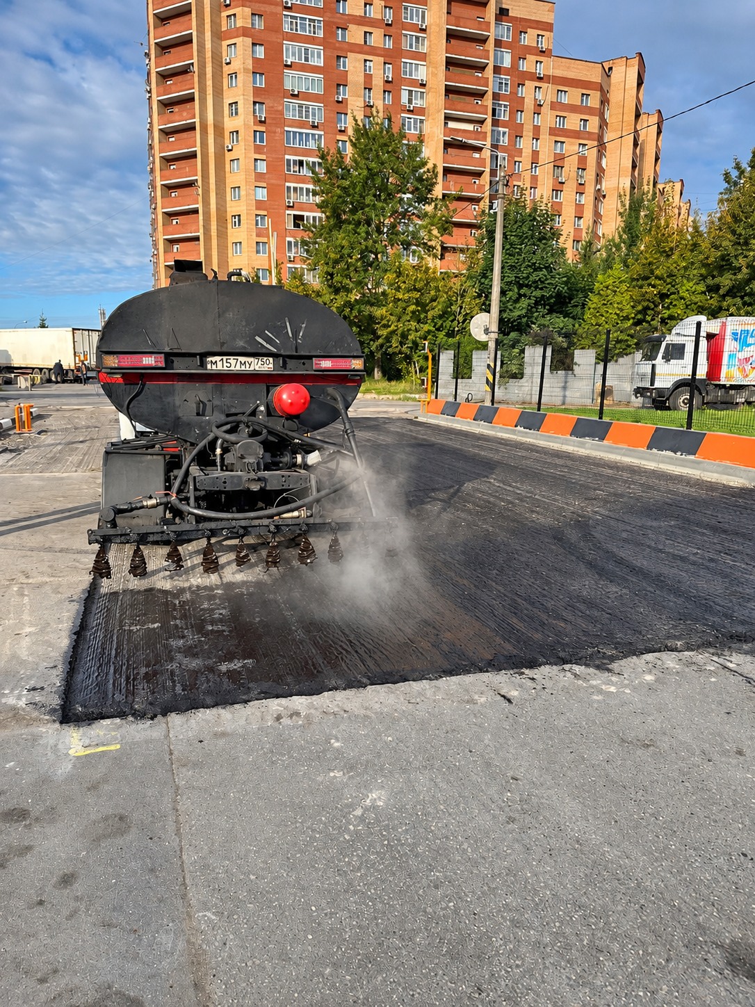 Обработка основания битумной эмульсией, Лесной Городок, Энергетиков, 10