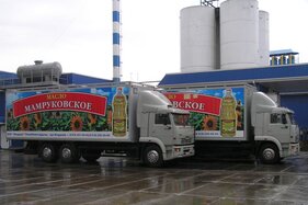 собственный брендированный автопарк с логотипом Мамруковское подсолнечное масла