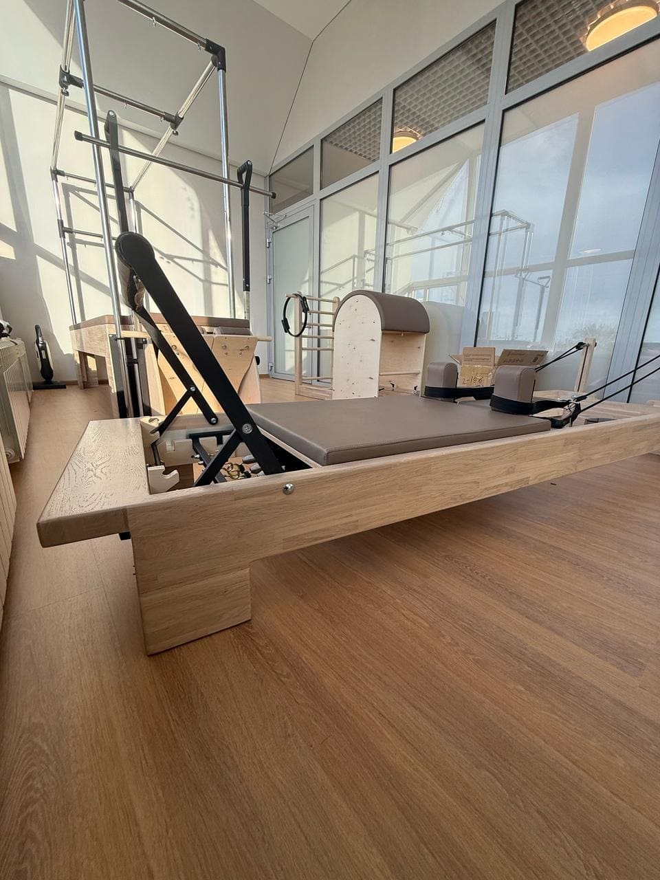 Регулируемый футбар и подголовник реформера