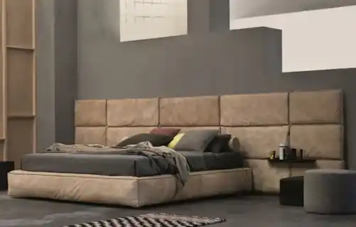 Мягкие стеновые панели в изголовье кровати