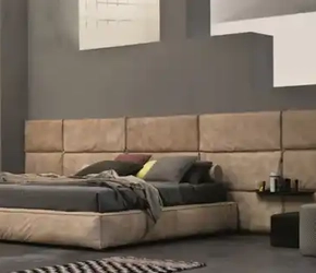 Мягкие стеновые панели в изголовье кровати